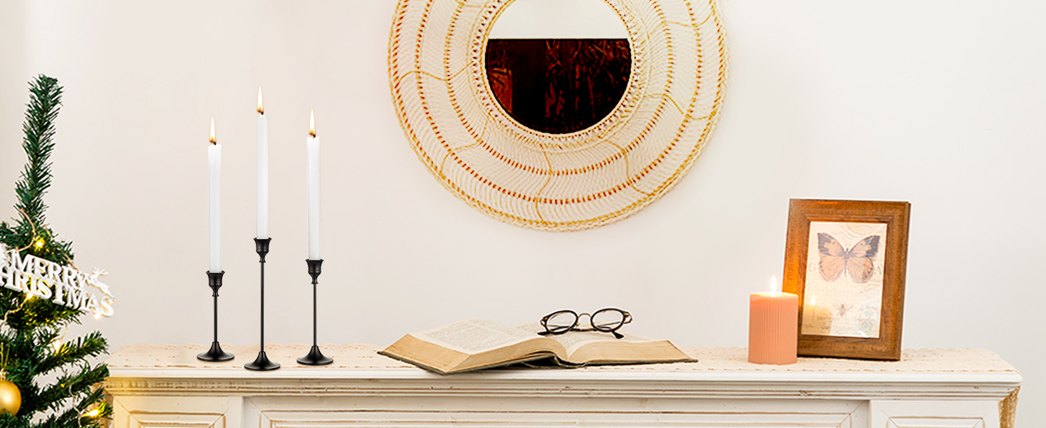 a mirror and a book on a mantle