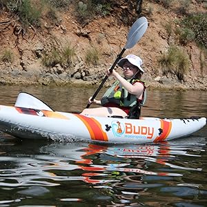 Young woman paddling the Buoy Watersports Echo Single Kayak