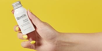 Kavella Teasing Powder held in hand