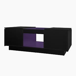 Modern black entertainment center or TV stand with geometric design, featuring a purple-accented open compartment in the middle.
