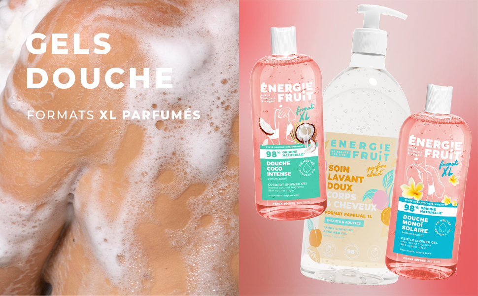 El texto dice «GELS DOUCHE». Expositor de tres frascos transparentes que contienen productos de gel de ducha sobre un fondo rosa con elementos de espuma.