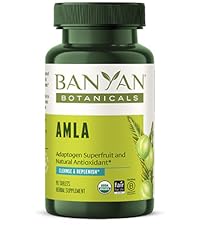 a green bottle of Amla tablets
