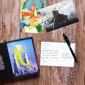 : A photograph of Dungeons & Dragons 100 Postcards on a table with a postcard filled out.