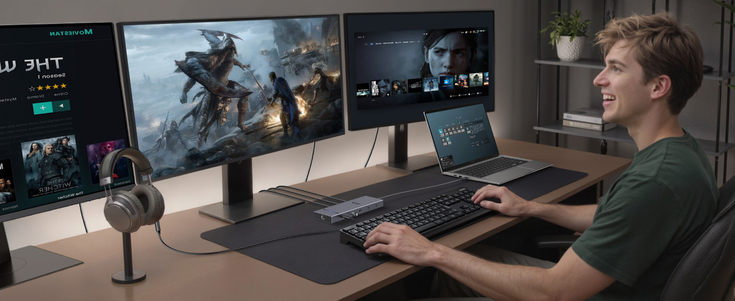 Multi-monitor PC gaming setup with three screens displaying game scenes. Person using keyboard and mouse on large desk pad. Gaming headphones on stand nearby.