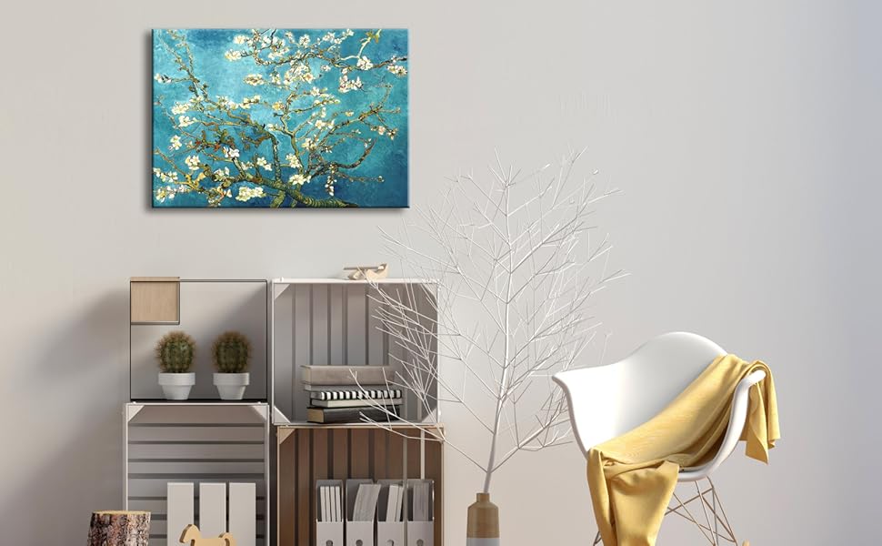 Living room scene with blue and white floral painting on wall. Wooden crates used as shelving, chair with yellow throw blanket.