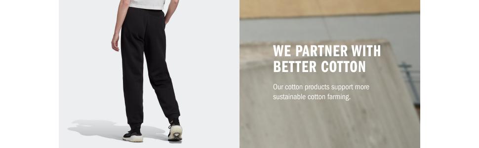 Text reads: 'BCI DENIM WITH BETTER COTTON'. Image shows black sweatpants or jogger-style pants against a neutral background.