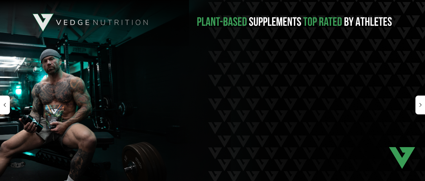 Vedge Nutrition plant-based supplement held by athlete in gym, promoting clean vegan performance.