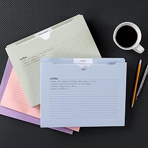 Smead notes file jackets, office setting, desk, pen, coffee mug, documents, pencils
