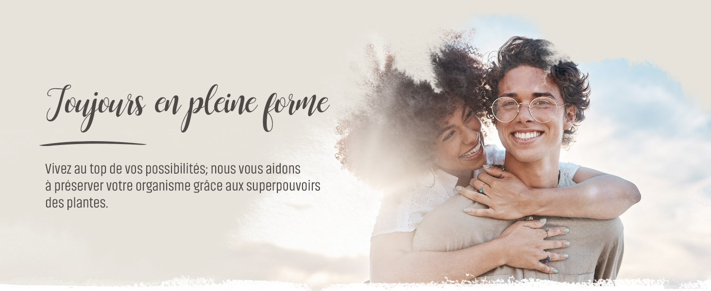 Image avec superposition de texte « Joyeux en plein forme » représentant une personne souriante aux cheveux bouclés à