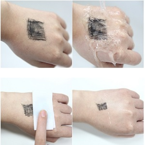 a photo of a hand with a black ink on it