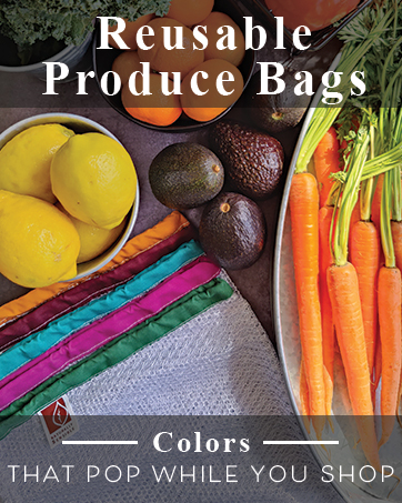 Colorful reusable mesh produce bags with fresh fruits and vegetables