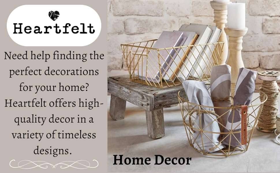 Heartfelt home decor in a variety of timeless designs are nicely organized on a table together