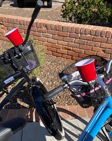 Convenient bike bottle holder, wheelchair cup holder. Securely holds small bottles