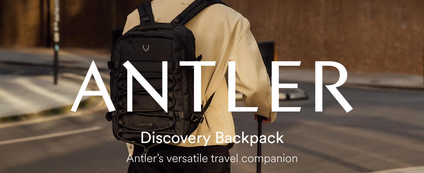 Product branding display showing 'ANTLER' text in illuminated setting with 'Discover backpack' messaging.