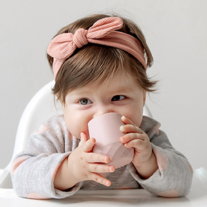 samigo baby holding cup blush