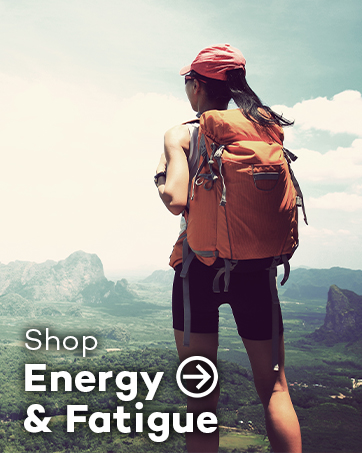 Hiker with large backpack overlooking mountainous landscape. Text overlay 'Shop Energy & Fatigue' with arrow, suggesting outdoor gear or supplements.
