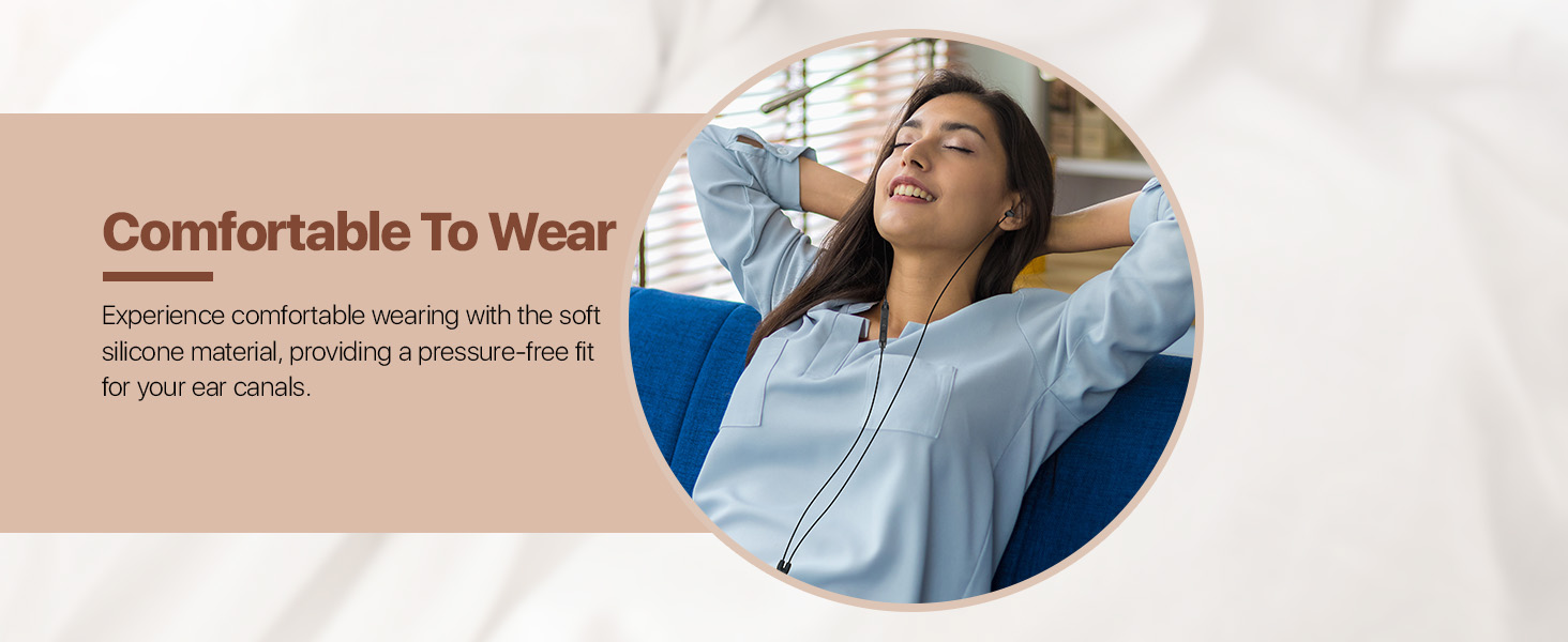 Woman wearing light blue shirt, relaxing with eyes closed and arms raised, demonstrating comfort of clothing. Text indicates garment is comfortable to wear.