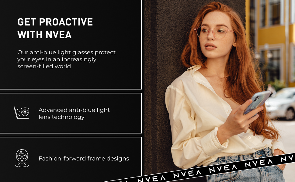 young woman wearing blue light blocking glasses posing by the wall and looking at the phone