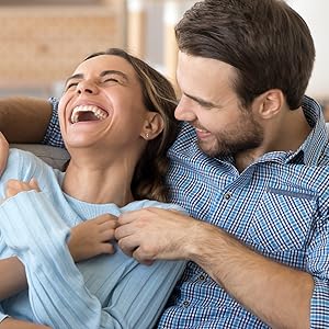 man and woman laughing