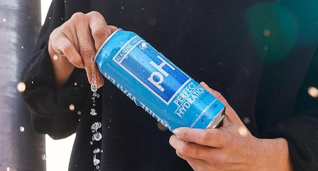 perfect hydration alkaline water can being opened