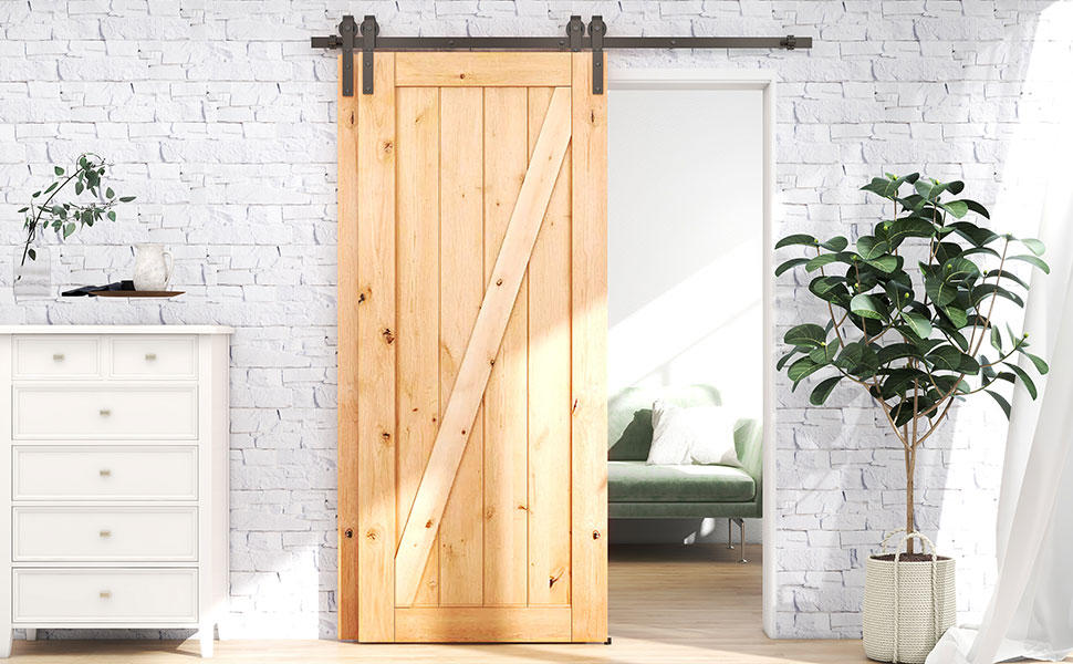 eine Scheunenschiebetür mit einem Metallrahmen.