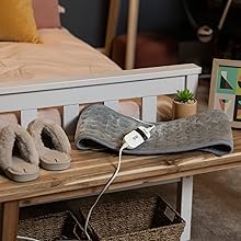 Step-by-step sequence showing installation or assembly process of what appears to be furniture or mounting hardware on a wooden surface.