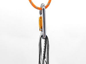 Metal carabiner with orange rope attached. Carabiner has a curved shape with a spring-loaded gate, commonly used for climbing or securing equipment.