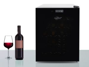 Thermoelectric wine cooler filled with bottles of red and white wine a glass of red wine beside it