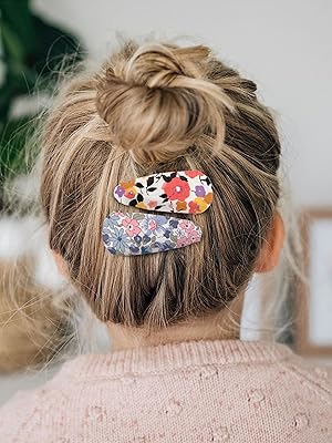 baby girls with snap clips