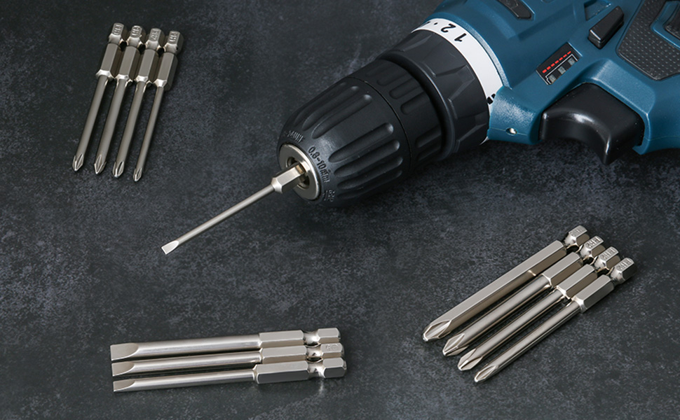 a drill and some tools on a table.