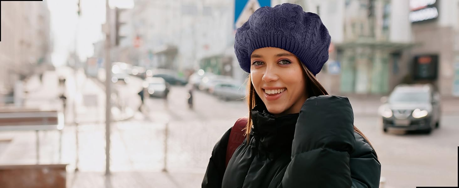women wearing a blue knitted beret in the city