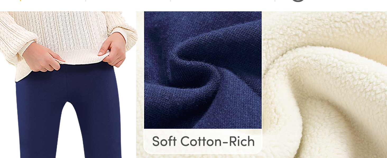 Demonstration aus Stoff mit hohem Baumwollanteil, bei der marineblaue Leggings gedehnt werden, mit Nahaufnahmen von marineblauen und cremefarbenen