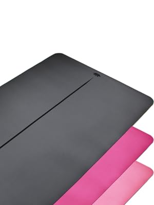 Multiple views of a two-tone black and pink surface or mat, shown from different angles displaying its dual-colored design.