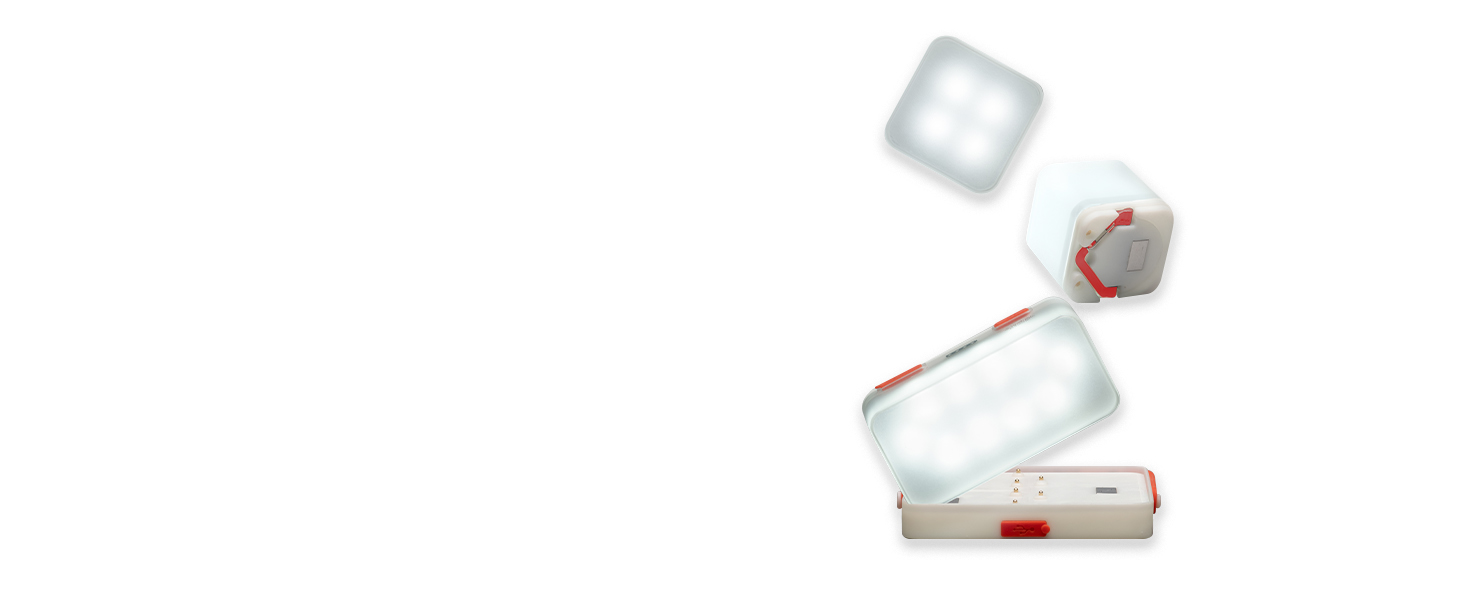 Composite image of LED light units floating above a docking base