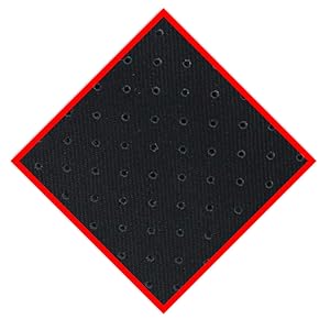 Black textured surface with repeating pattern of small circular indentations, framed by red border in diamond orientation.