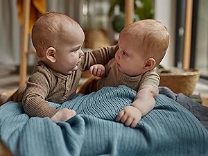 Two lovely babies on Huxie products