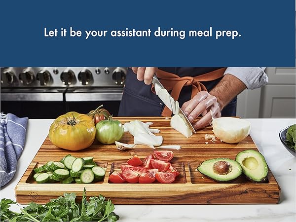 Sonder Los Angeles Bradbury teak board compartments can be used for scraps and organization.