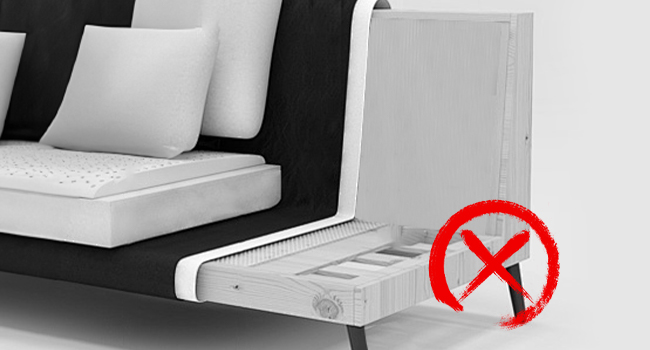 Modern furniture safety illustration showing a sofa with white cushions and a red 'no' symbol warning of potential hazards underneath.