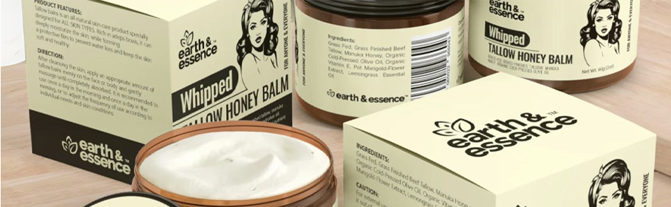 Jars and boxes of whipped tallow honey balm product. Cream-colored containers with brown and black text. Open jar shows white, creamy product texture.