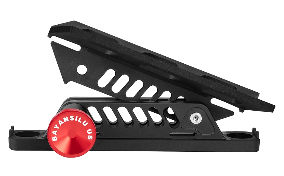 Close-up of quick-release fire extinguisher mount showing secure clamp and rubberized padding