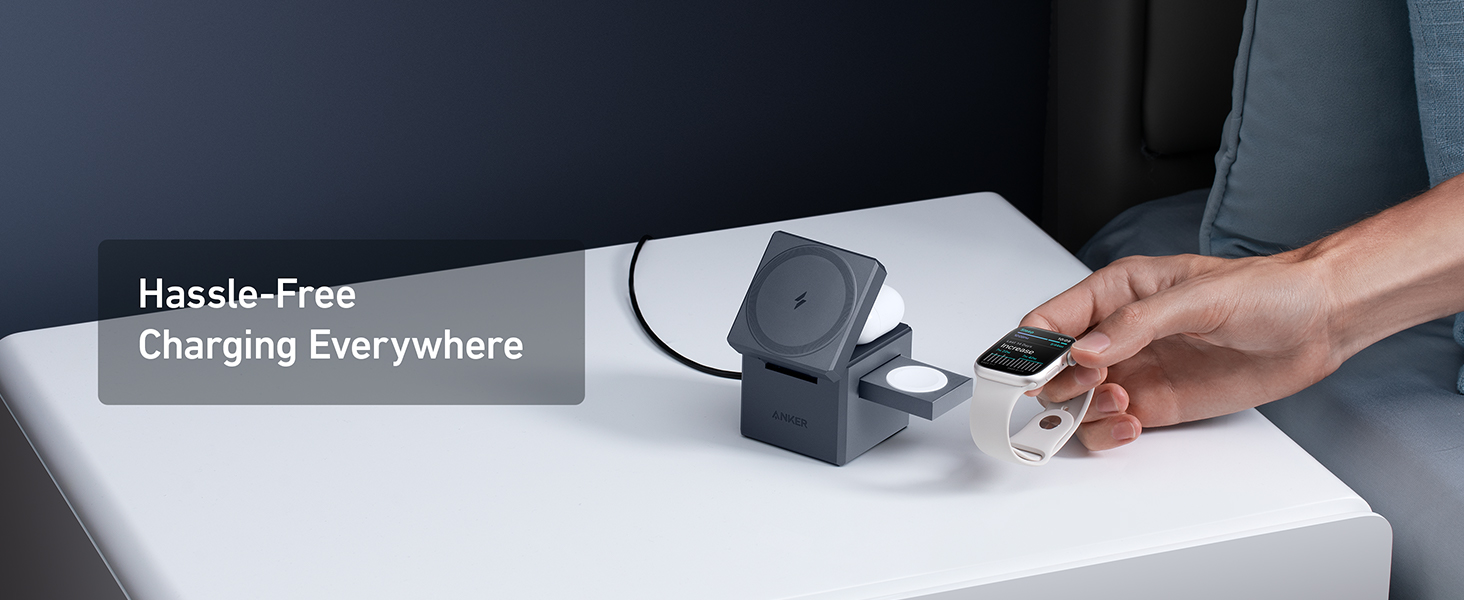 Wireless charging device with text 'Hassle-Free Charging Everywhere'. Hand placing a smartphone on the charger, demonstrating its use.