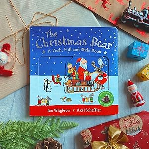 Lifestyle image of front cover of the book with christmas props