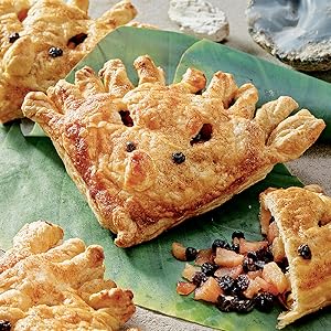 Baked pastry that look like dinosaur faces. 