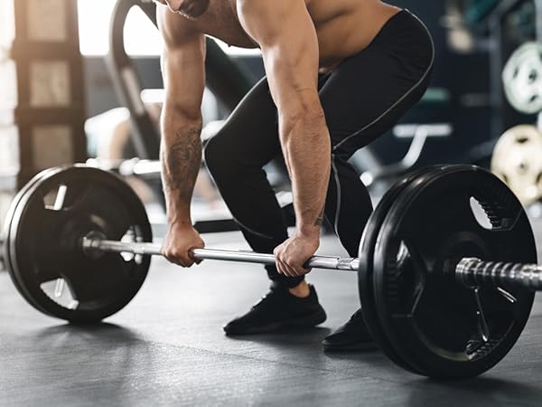 BulkSupplements Magnesium Glycinate Powder Man Preparing to Lift Weights