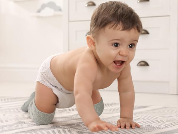 baby crawling on the carpet