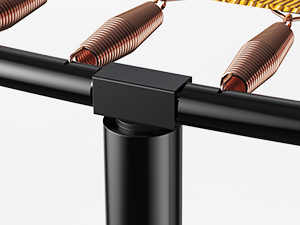 Close-up of a black metal fishing rod handle with copper-colored spring coils and yellow cord visible. Shows part of the reel seat mechanism.