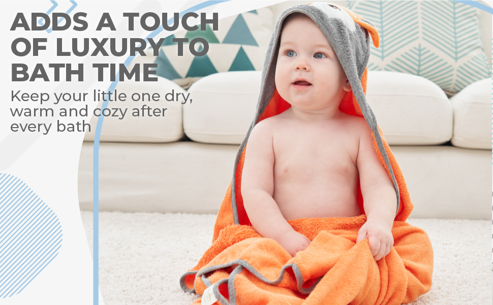 Toddler wrapped in a fox towel added a touch of luxury to bath time while keeping them warm and cozy