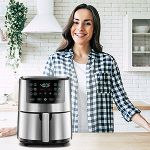 woman smiling on clean kitchen with air fryer
