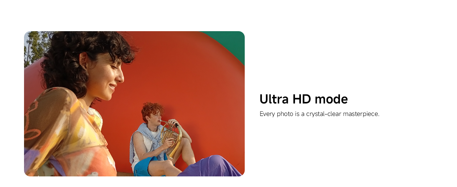 Text reads 'Ultra HD mode'. Marketing photo showing two people against a vibrant red background in a high-definition display demonstration.