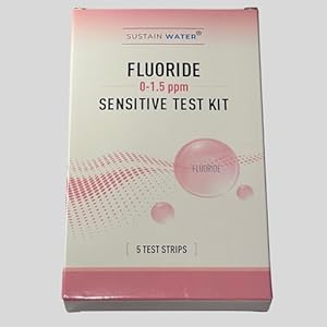 Pink and white box labeled as Fluoride Sensitive Test Kit with circular wave pattern design.